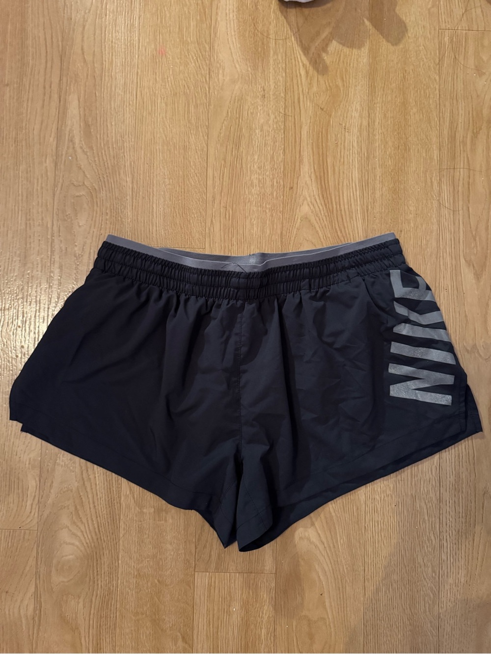 Nike Women's Navy Athletic Shorts with Gray Logo